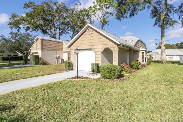 9529 Bunker Hill Ct Unit 9529, New Port Richey, FL 34655 - view of front of house with driveway, an attached garage, a front lawn, stucco siding, and central AC unit