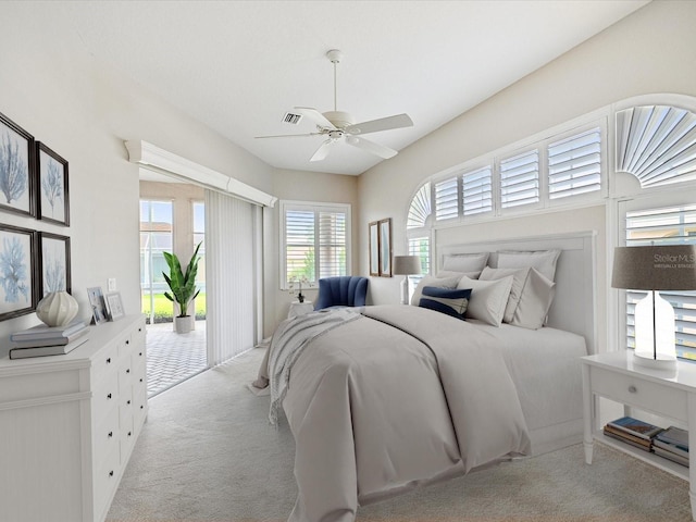 13922 Talmage Loop, Hudson, FL 34667 - carpeted bedroom with access to outside and ceiling fan