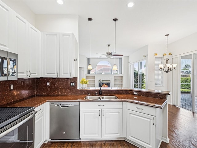 13922 Talmage Loop, Hudson, FL 34667 - kitchen featuring stainless steel appliances, a sink, plenty of natural light, ceiling fan, and recessed lighting