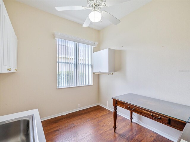 13922 Talmage Loop, Hudson, FL 34667 - unfurnished office with a ceiling fan, wood finished floors, and baseboards