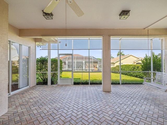 13922 Talmage Loop, Hudson, FL 34667 - unfurnished sunroom with a ceiling fan