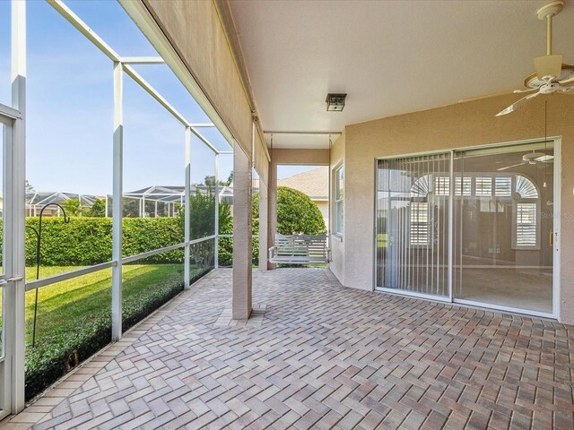 13922 Talmage Loop, Hudson, FL 34667 - unfurnished sunroom with a ceiling fan
