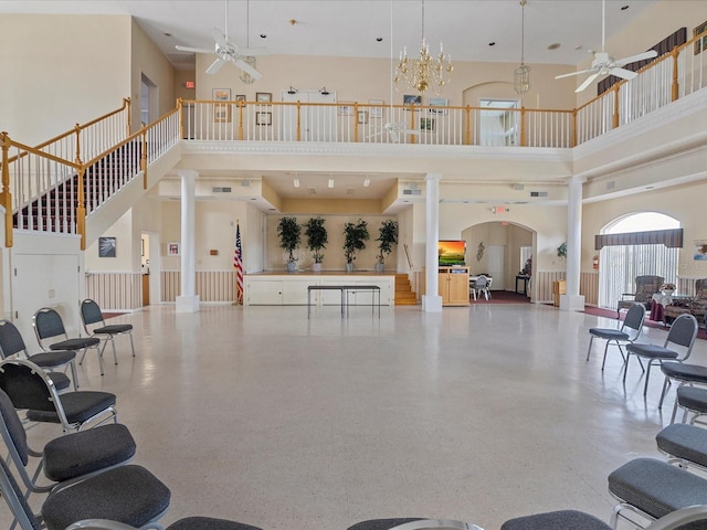 13922 Talmage Loop, Hudson, FL 34667 - community lobby featuring a towering ceiling and stairway