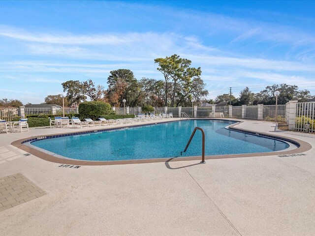 13922 Talmage Loop, Hudson, FL 34667 - community pool featuring a patio area