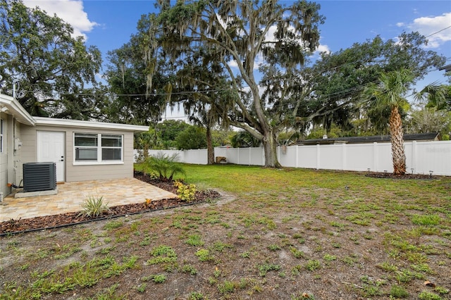 7545 Banner St, New Port Richey, FL 34653 - view of yard featuring a patio area and cooling unit