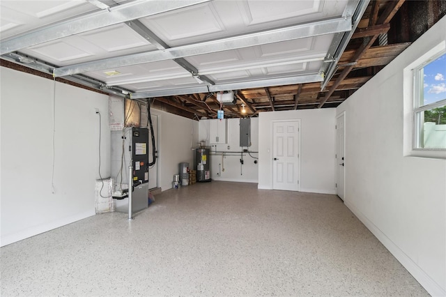 7545 Banner St, New Port Richey, FL 34653 - garage featuring heating unit, water heater, electric panel, and baseboards