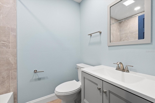4939 Floramar Ter Unit 611, New Port Richey, FL 34652 - bathroom featuring toilet, vanity, a shower, and a bath