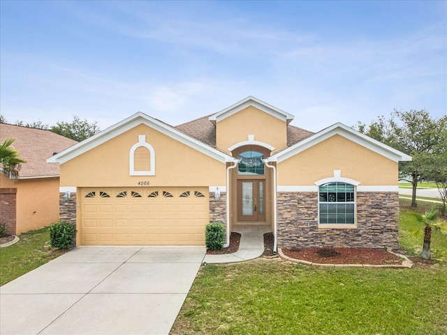 4266 High Ridge Ave, Spring Hill, FL 34609 - view of front of house featuring stone siding, stucco siding, driveway, and a front lawn