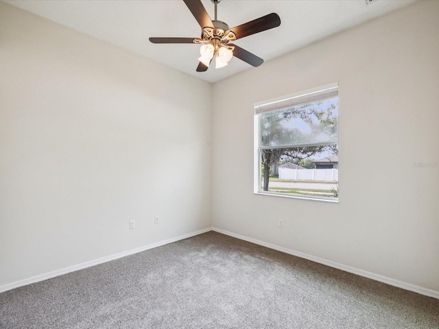 4266 High Ridge Ave, Spring Hill, FL 34609 - empty room with carpet flooring, baseboards, and a ceiling fan
