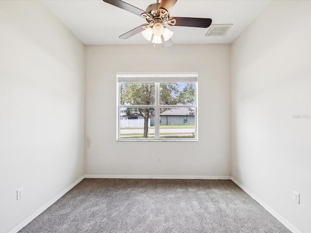 4266 High Ridge Ave, Spring Hill, FL 34609 - unfurnished room with carpet flooring, a ceiling fan, and baseboards