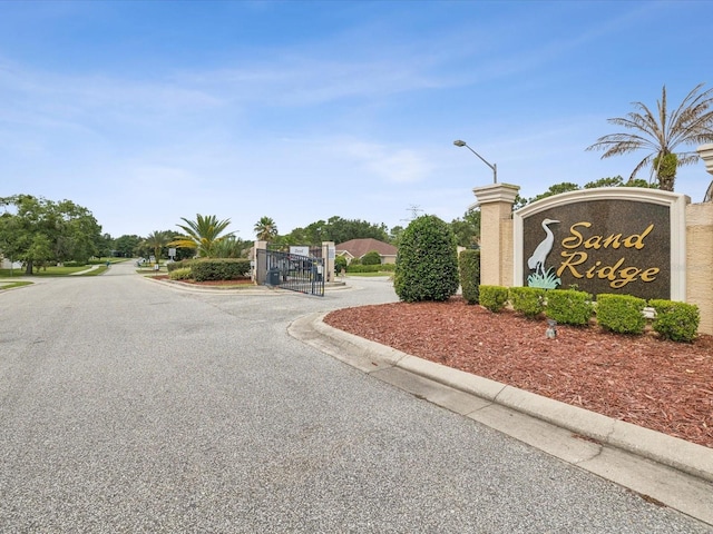 4266 High Ridge Ave, Spring Hill, FL 34609 - community / neighborhood sign with a gate