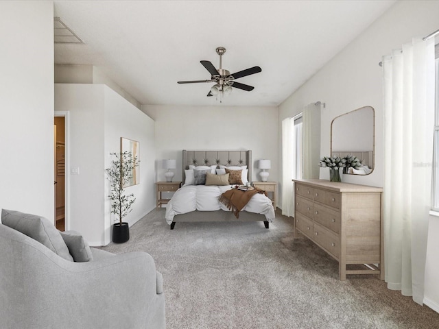 4266 High Ridge Ave, Spring Hill, FL 34609 - bedroom featuring carpet flooring and a ceiling fan