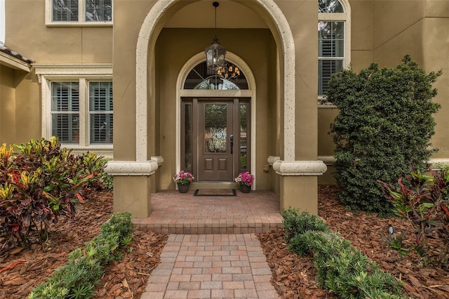 10531 Pontofino Cir, Trinity, FL 34655 - view of exterior entry with stucco siding