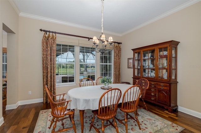 10531 Pontofino Cir, Trinity, FL 34655 - dining room with a chandelier, crown molding, wood finished floors, and baseboards