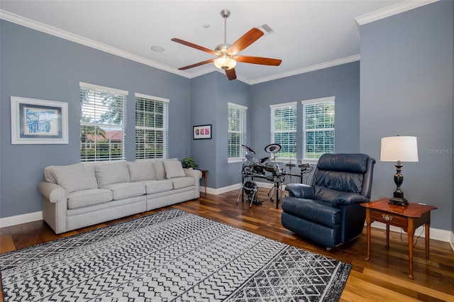 10531 Pontofino Cir, Trinity, FL 34655 - living area featuring wood finished floors, ceiling fan, baseboards, and crown molding
