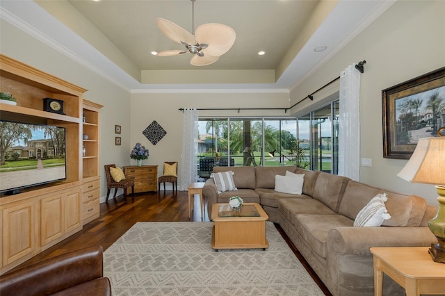 10531 Pontofino Cir, Trinity, FL 34655 - living area with wood finished floors, a tray ceiling, ceiling fan, ornamental molding, and recessed lighting