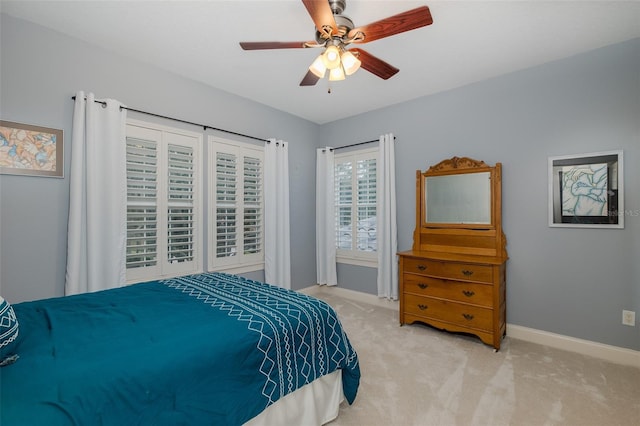 10531 Pontofino Cir, Trinity, FL 34655 - carpeted bedroom featuring baseboards and a ceiling fan