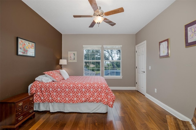 10531 Pontofino Cir, Trinity, FL 34655 - bedroom with hardwood / wood-style flooring, baseboards, and ceiling fan