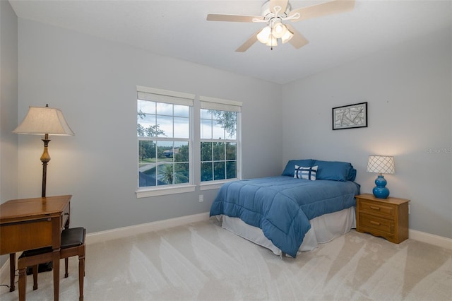 10531 Pontofino Cir, Trinity, FL 34655 - bedroom featuring carpet, baseboards, and a ceiling fan