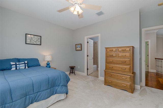10531 Pontofino Cir, Trinity, FL 34655 - bedroom with light colored carpet, baseboards, and a ceiling fan