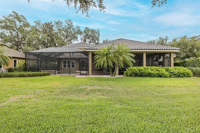 10531 Pontofino Cir, Trinity, FL 34655 - back of house featuring a tiled roof, a yard, a lanai, and a patio