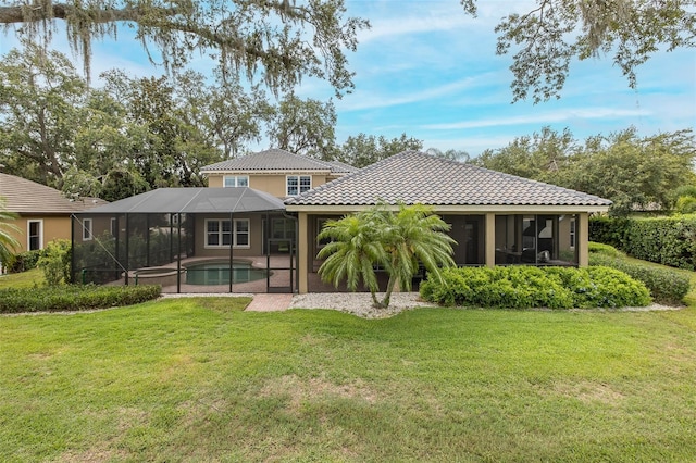 10531 Pontofino Cir, Trinity, FL 34655 - rear view of property with an outdoor pool, a tiled roof, a yard, glass enclosure, and a patio area