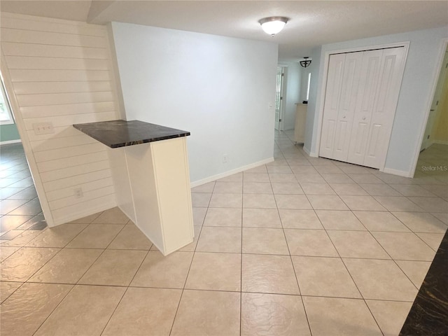 7313 Hatteras Dr, Hudson, FL 34667 - interior space featuring light tile patterned floors and baseboards