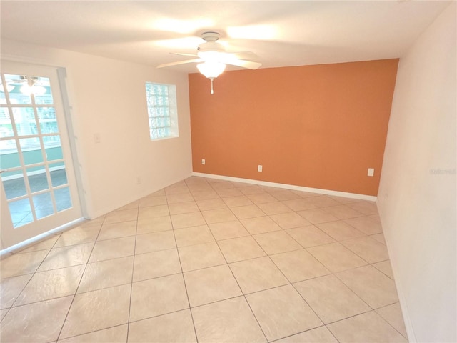 7313 Hatteras Dr, Hudson, FL 34667 - spare room featuring a ceiling fan and light tile patterned flooring