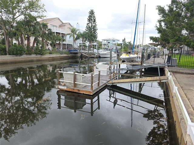 7313 Hatteras Dr, Hudson, FL 34667 - dock featuring a water view and boat lift