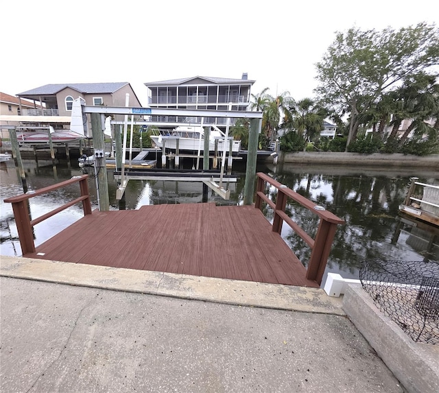 7313 Hatteras Dr, Hudson, FL 34667 - dock area featuring boat lift and a water view