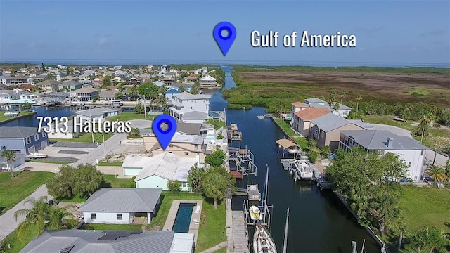 7313 Hatteras Dr, Hudson, FL 34667 - aerial view of residential area featuring a large body of water