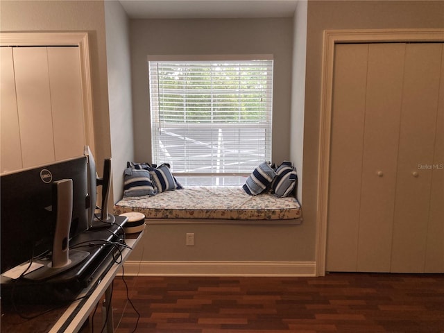 2880 Chelsea Pl N, Clearwater, FL 33759 - sitting room featuring dark wood-type flooring and baseboards