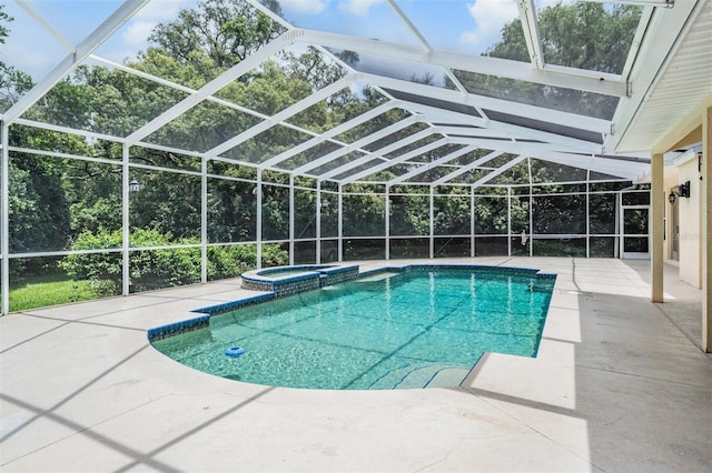 2880 Chelsea Pl N, Clearwater, FL 33759 - view of pool featuring a patio area, a pool with connected hot tub, and a lanai