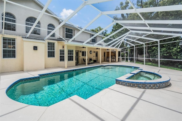 2880 Chelsea Pl N, Clearwater, FL 33759 - view of pool with a ceiling fan, a patio area, a lanai, and a pool with connected hot tub