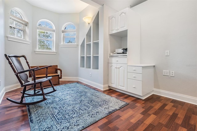 2880 Chelsea Pl N, Clearwater, FL 33759 - living area featuring dark wood finished floors and baseboards