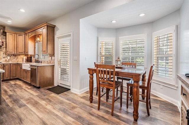 2880 Chelsea Pl N, Clearwater, FL 33759 - dining area featuring wood finished floors and recessed lighting