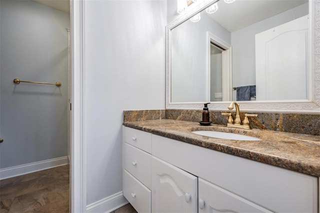 2880 Chelsea Pl N, Clearwater, FL 33759 - bathroom featuring vanity and baseboards