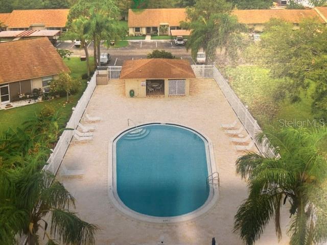 10670 43rd St N Unit 204, Clearwater, FL 33762 - community pool with a patio