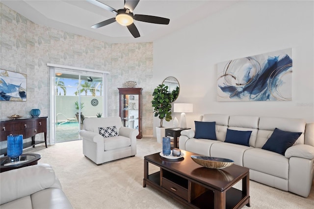 10250 Locker Dr, Spring Hill, FL 34608 - carpeted living area featuring ceiling fan