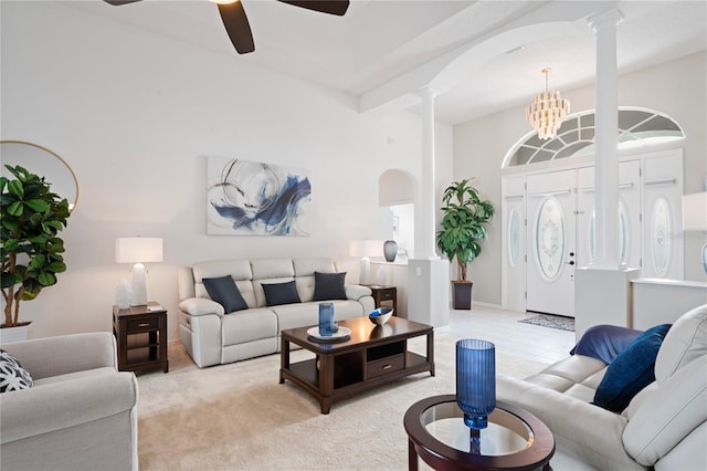 10250 Locker Dr, Spring Hill, FL 34608 - living area featuring decorative columns, arched walkways, and ceiling fan