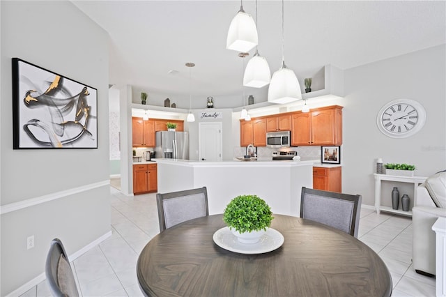 10250 Locker Dr, Spring Hill, FL 34608 - dining space featuring light tile patterned floors and baseboards