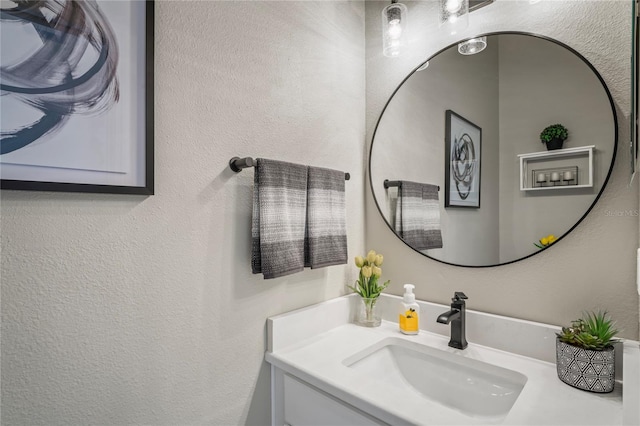 10250 Locker Dr, Spring Hill, FL 34608 - bathroom featuring vanity and a textured wall