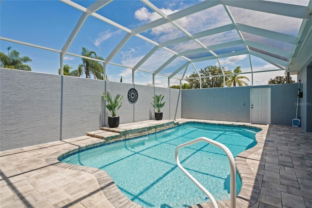 10250 Locker Dr, Spring Hill, FL 34608 - view of pool with a patio area and glass enclosure