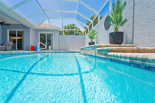 10250 Locker Dr, Spring Hill, FL 34608 - swimming pool with a ceiling fan and a lanai