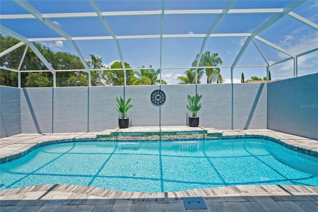10250 Locker Dr, Spring Hill, FL 34608 - outdoor pool featuring glass enclosure