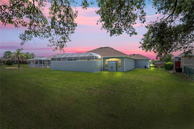 10250 Locker Dr, Spring Hill, FL 34608 - view of green lawn featuring glass enclosure