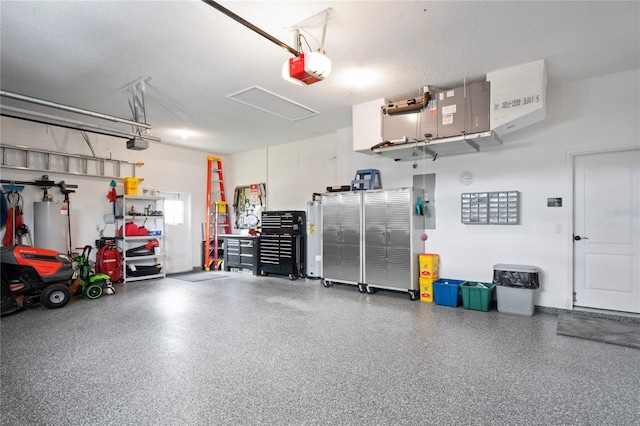 10250 Locker Dr, Spring Hill, FL 34608 - garage featuring a garage door opener and water heater