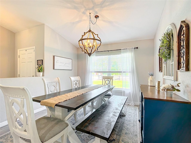 12396 SW 64th Street Rd, Ocala, FL 34481 - dining area with a chandelier and wood finished floors