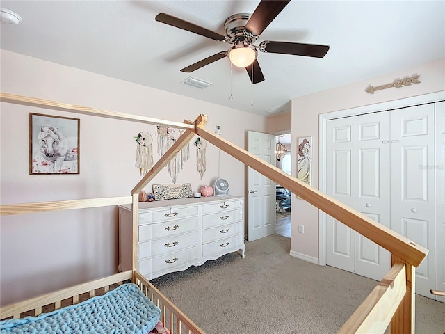 12396 SW 64th Street Rd, Ocala, FL 34481 - carpeted bedroom with a closet and ceiling fan