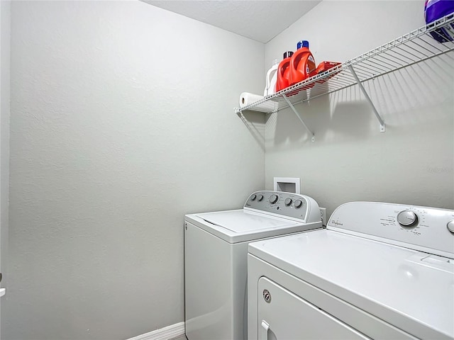 12396 SW 64th Street Rd, Ocala, FL 34481 - laundry room featuring washer and clothes dryer